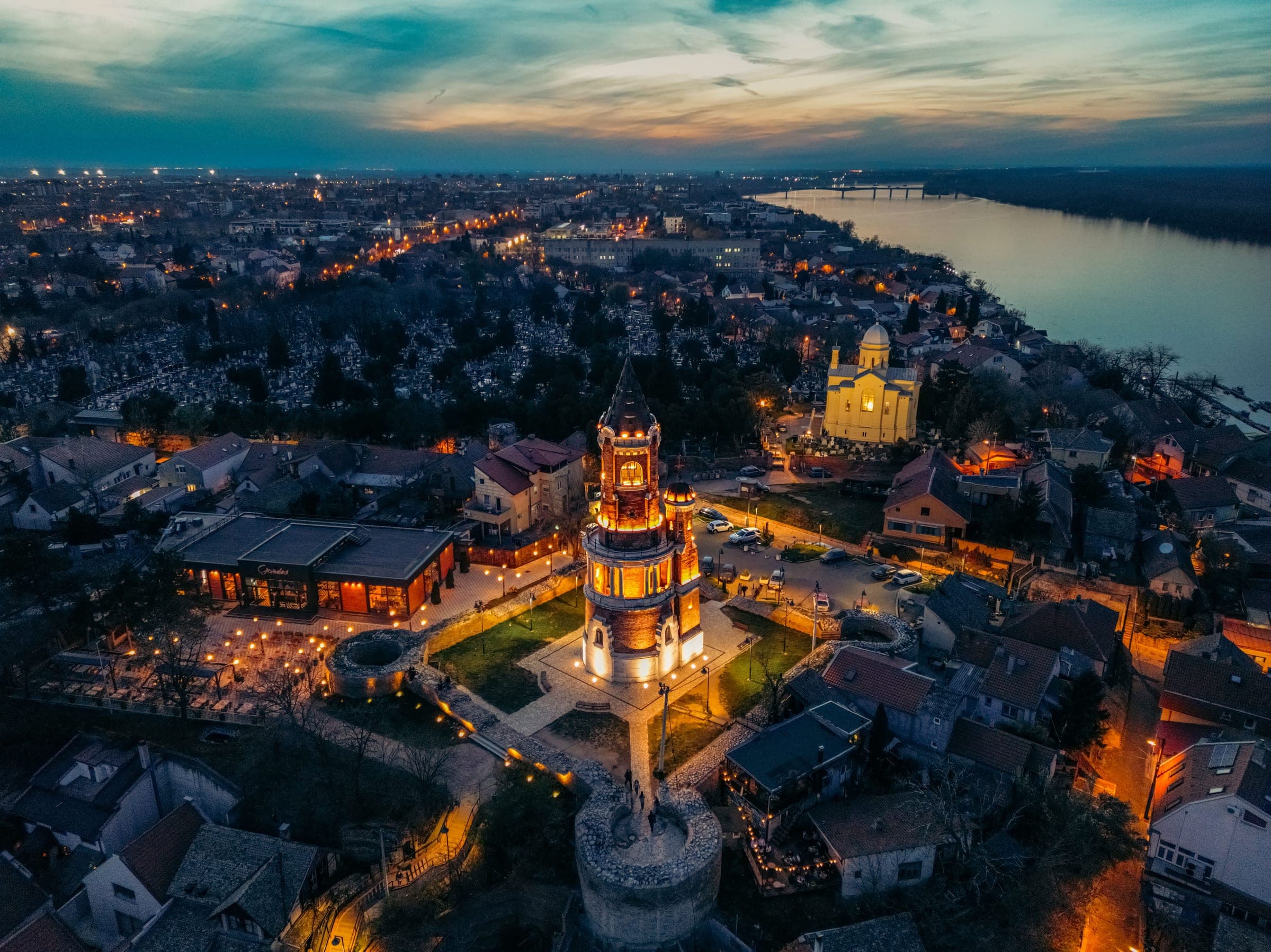 Gardoš Tower above the old roofs of Zemun at dusk, Belgrade